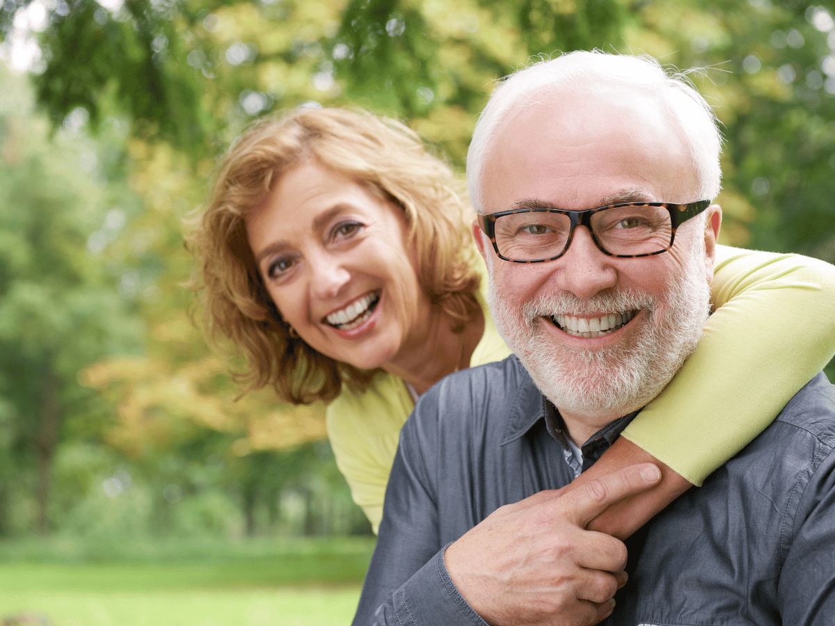 smiling elder couple - HRT dosages